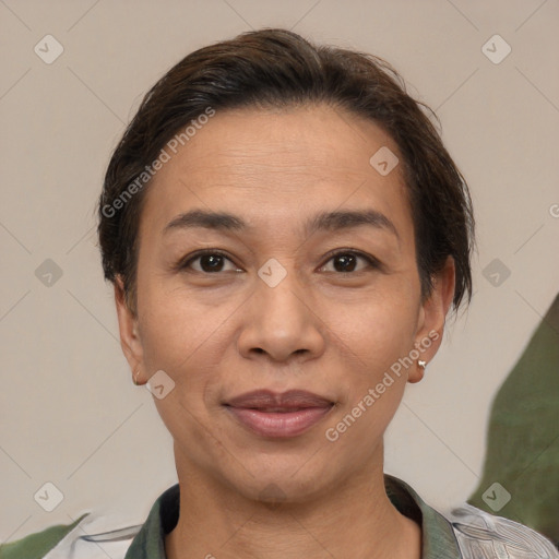 Joyful white adult female with short  brown hair and brown eyes