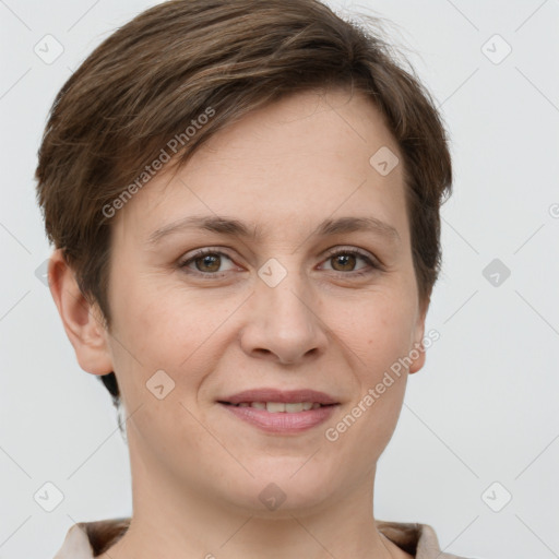 Joyful white young-adult female with short  brown hair and grey eyes