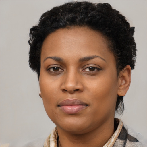 Neutral black young-adult female with short  black hair and brown eyes