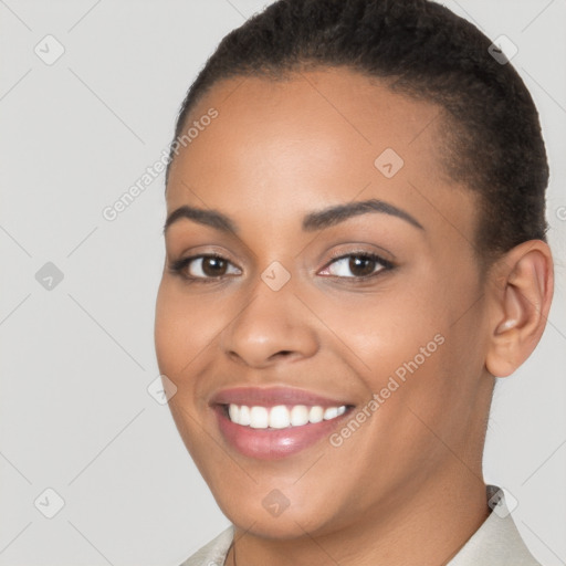 Joyful latino young-adult female with short  brown hair and brown eyes