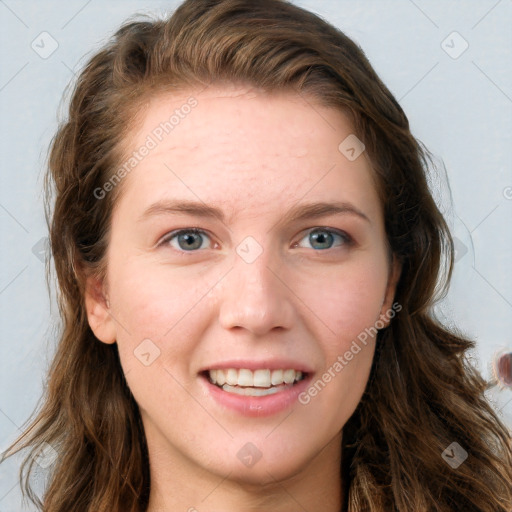 Joyful white young-adult female with long  brown hair and blue eyes