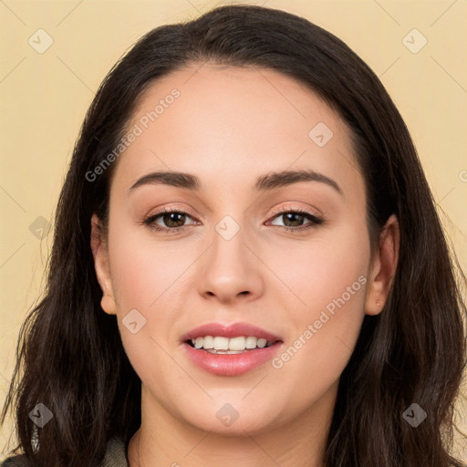 Joyful white young-adult female with long  black hair and brown eyes