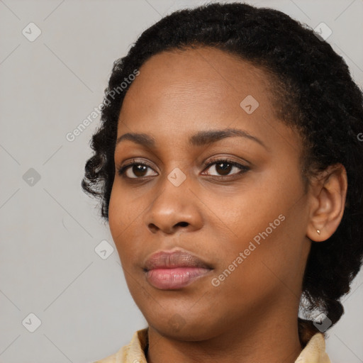 Neutral black young-adult female with long  black hair and brown eyes