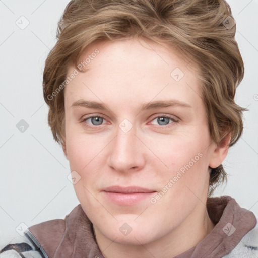 Joyful white young-adult female with medium  brown hair and blue eyes