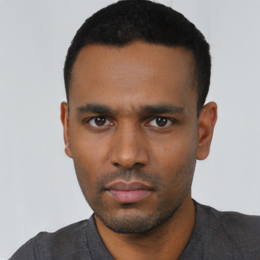 Neutral black young-adult male with short  black hair and brown eyes