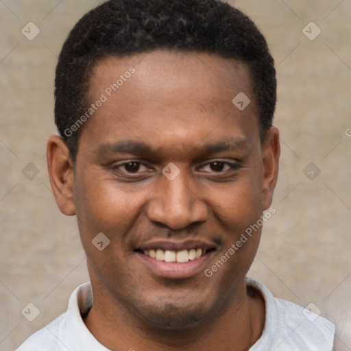 Joyful latino young-adult male with short  brown hair and brown eyes