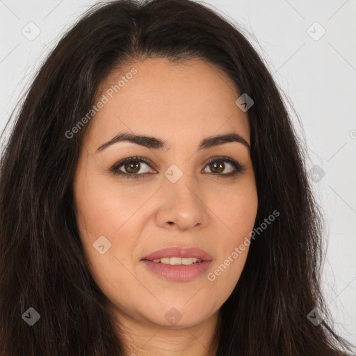 Joyful white young-adult female with long  brown hair and brown eyes