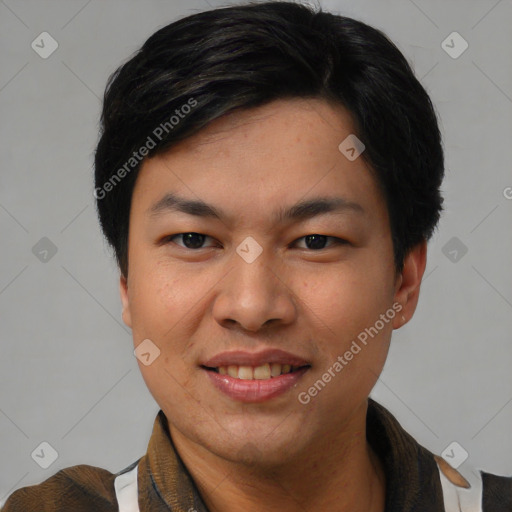 Joyful asian young-adult male with short  black hair and brown eyes