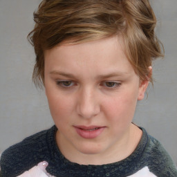 Joyful white child female with short  brown hair and brown eyes