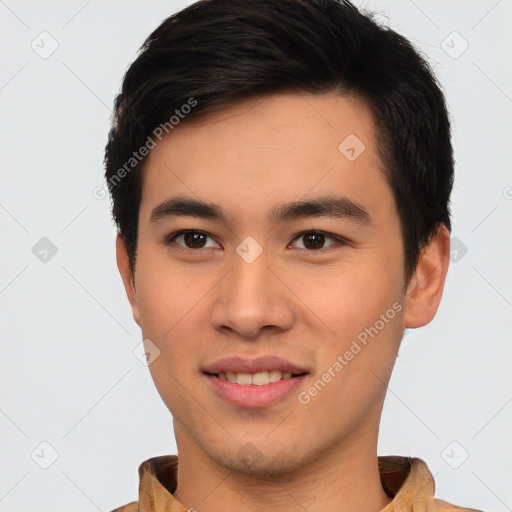 Joyful asian young-adult male with short  brown hair and brown eyes