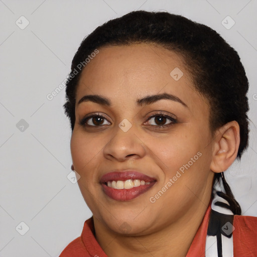 Joyful latino young-adult female with short  black hair and brown eyes