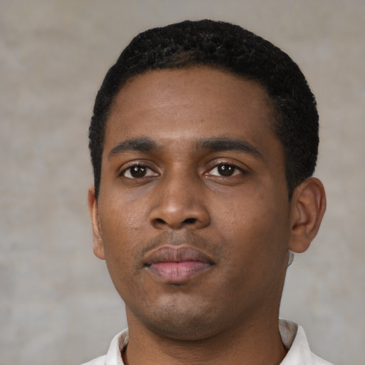 Neutral black young-adult male with short  black hair and brown eyes
