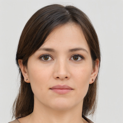 Neutral white young-adult female with medium  brown hair and brown eyes