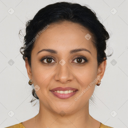 Joyful latino young-adult female with long  brown hair and brown eyes