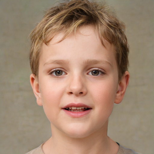 Joyful white child male with short  brown hair and brown eyes