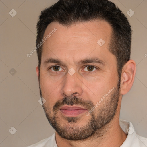 Joyful white adult male with short  brown hair and brown eyes