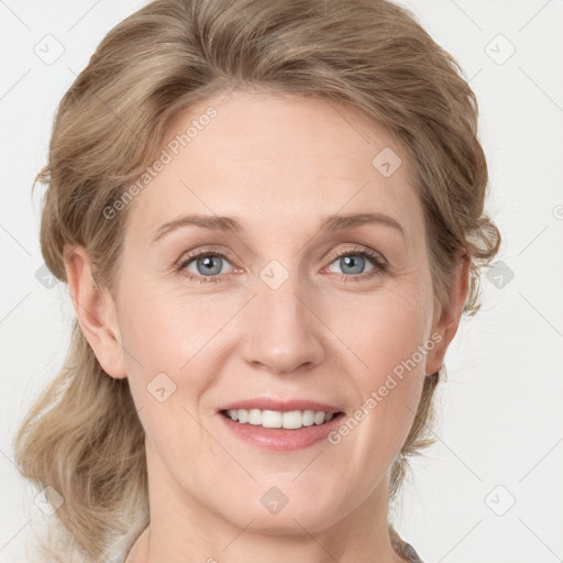 Joyful white young-adult female with medium  brown hair and blue eyes