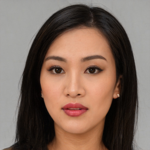 Neutral asian young-adult female with long  black hair and brown eyes