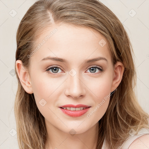 Joyful white young-adult female with long  brown hair and blue eyes