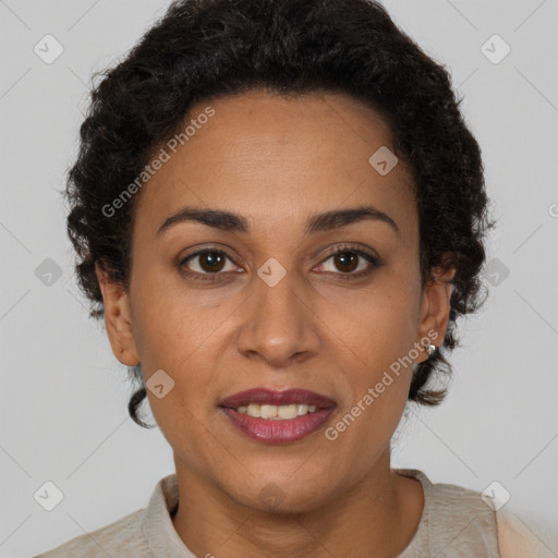 Joyful latino adult female with short  brown hair and brown eyes