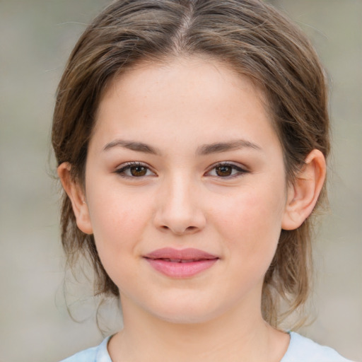 Joyful white child female with medium  brown hair and brown eyes