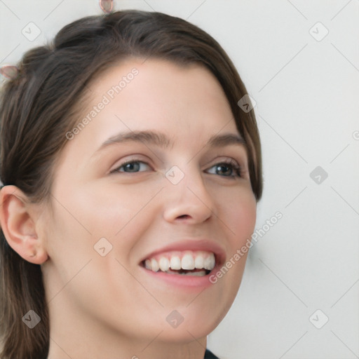 Joyful white young-adult female with long  brown hair and grey eyes