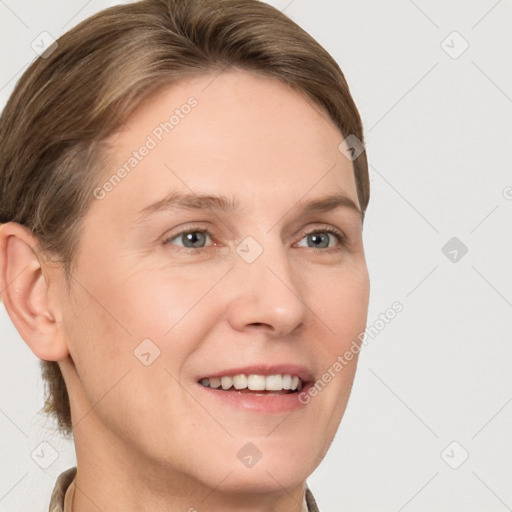 Joyful white young-adult female with short  brown hair and grey eyes