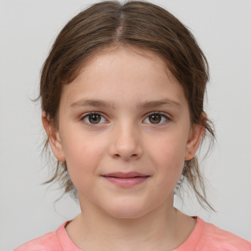 Joyful white child female with medium  brown hair and brown eyes