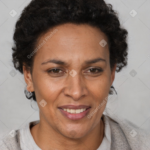 Joyful latino adult female with short  brown hair and brown eyes