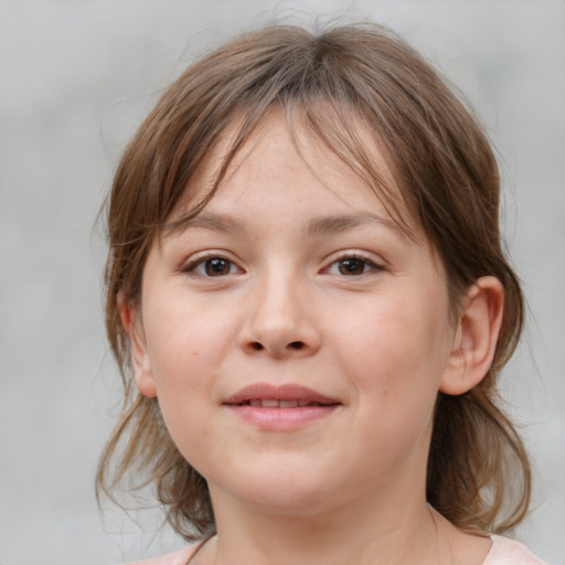 Joyful white child female with medium  brown hair and grey eyes