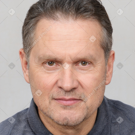 Joyful white middle-aged male with short  brown hair and brown eyes