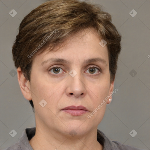 Joyful white adult male with short  brown hair and grey eyes