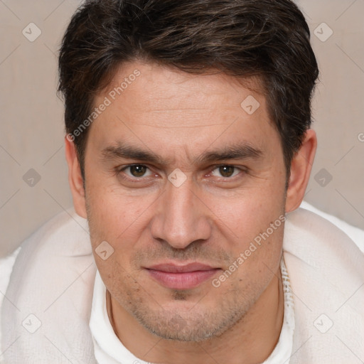 Joyful white adult male with short  brown hair and brown eyes