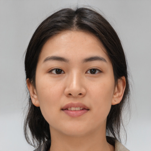 Neutral asian young-adult female with medium  brown hair and brown eyes