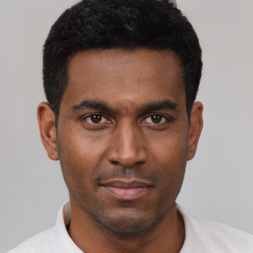 Neutral black young-adult male with short  black hair and brown eyes