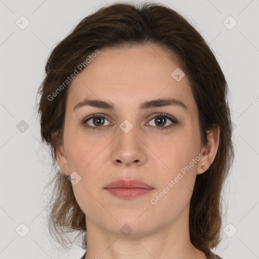 Neutral white young-adult female with medium  brown hair and brown eyes