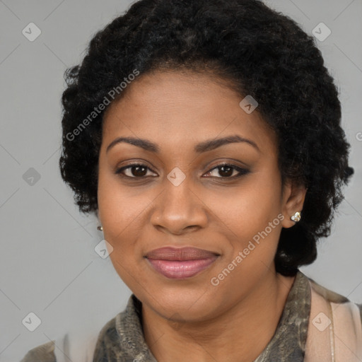 Joyful black young-adult female with long  brown hair and brown eyes