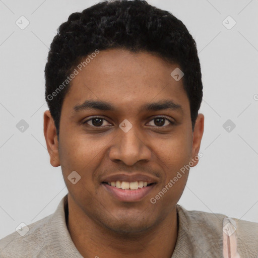 Joyful black young-adult male with short  black hair and brown eyes