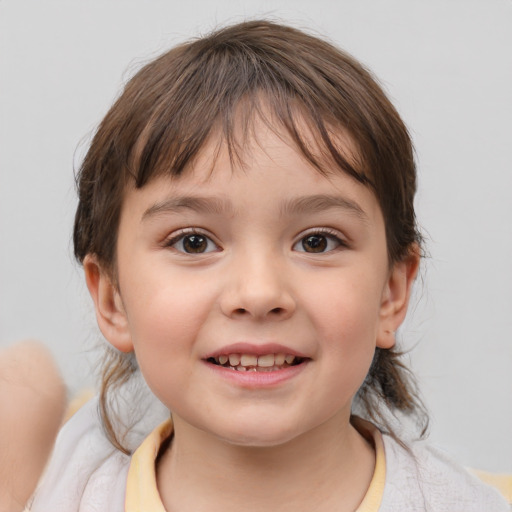 Joyful white child female with medium  brown hair and brown eyes