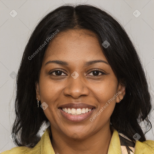 Joyful black young-adult female with medium  black hair and brown eyes