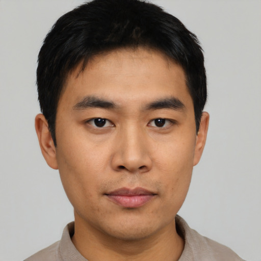 Neutral asian young-adult male with short  black hair and brown eyes