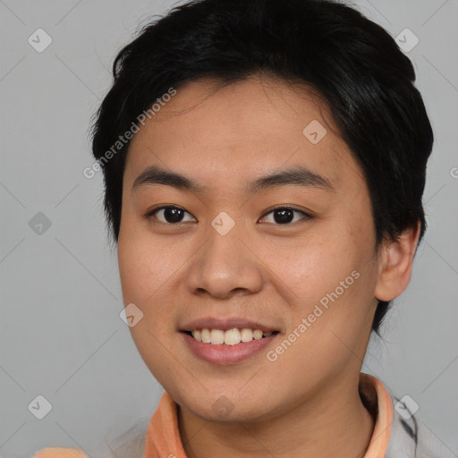 Joyful asian young-adult female with short  brown hair and brown eyes