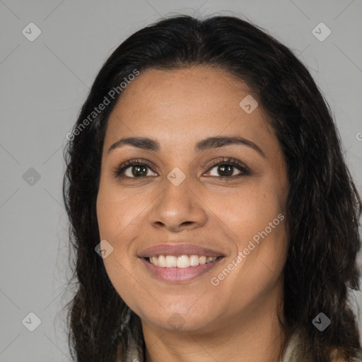 Joyful latino young-adult female with long  brown hair and brown eyes