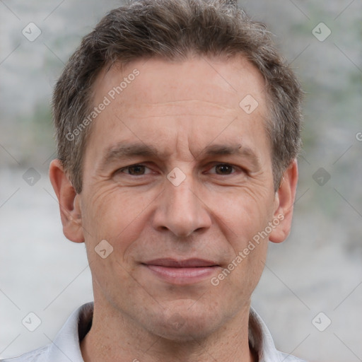 Joyful white middle-aged male with short  brown hair and brown eyes