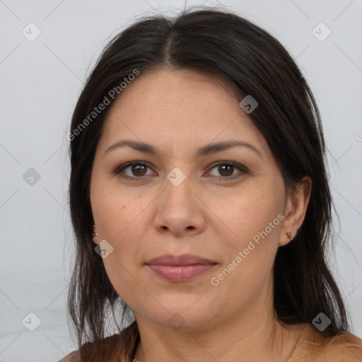 Joyful white adult female with medium  brown hair and brown eyes