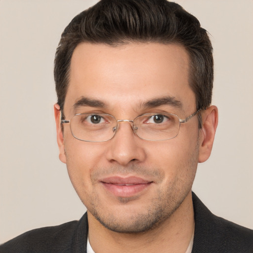 Joyful white adult male with short  brown hair and brown eyes