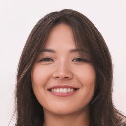 Joyful asian young-adult female with long  brown hair and brown eyes