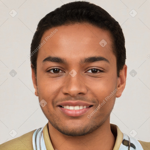 Joyful latino young-adult male with short  brown hair and brown eyes