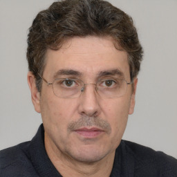 Neutral white adult male with short  brown hair and brown eyes