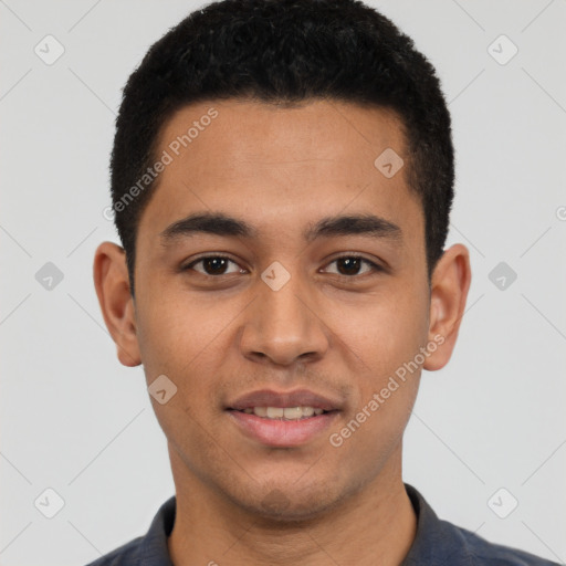 Joyful white young-adult male with short  black hair and brown eyes